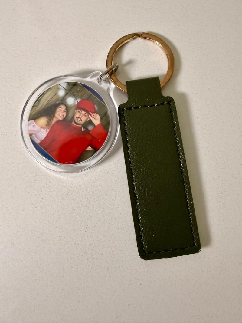 RK360 on-site photo keychain and magnet maker with finished keepsakes