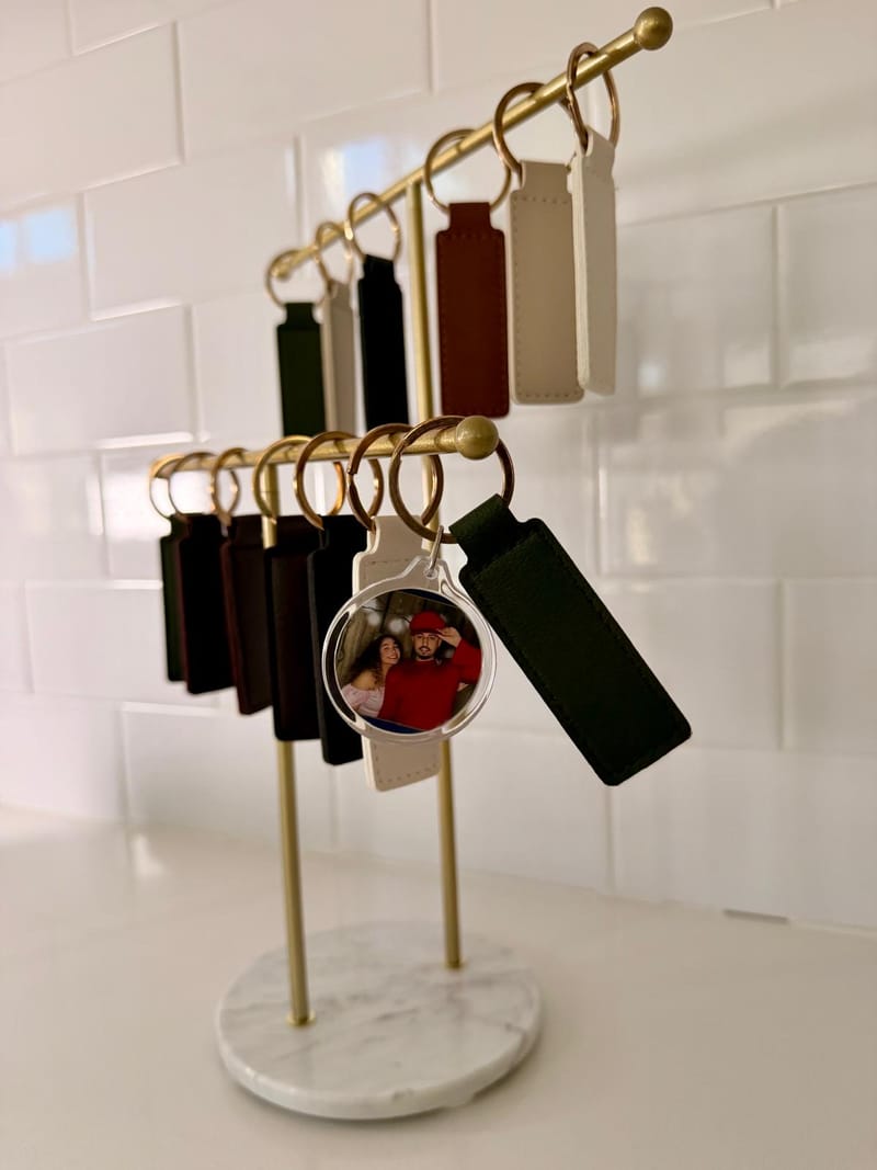 RK360 on-site photo keychain and magnet maker with finished keepsakes
